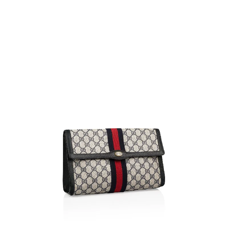 Women Gucci Sylvie bags with a monogram - embossed leatherGucci linea vintage clutch