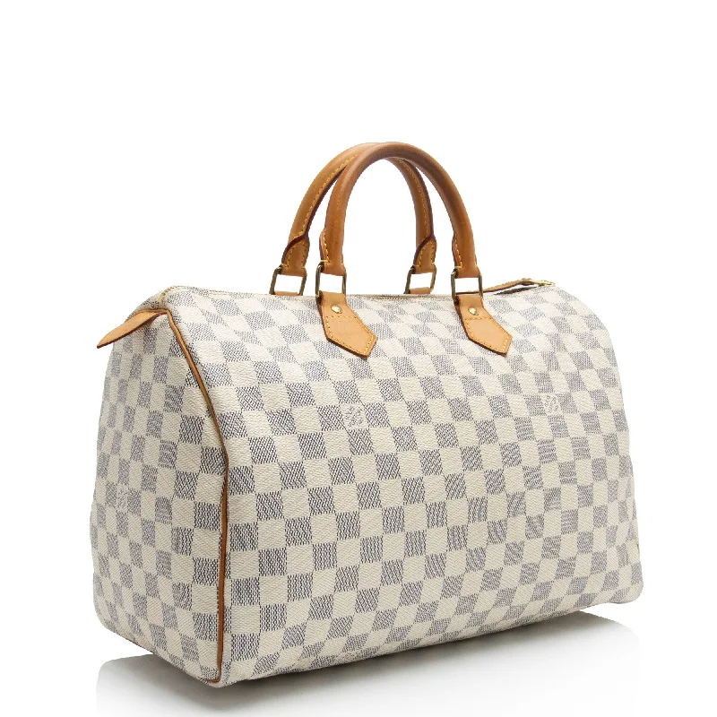 Louis Vuitton Twist bags with the iconic LV - turnlock closureLouis Vuitton Damier Azur Speedy 35 Satchel (LBu6mk)