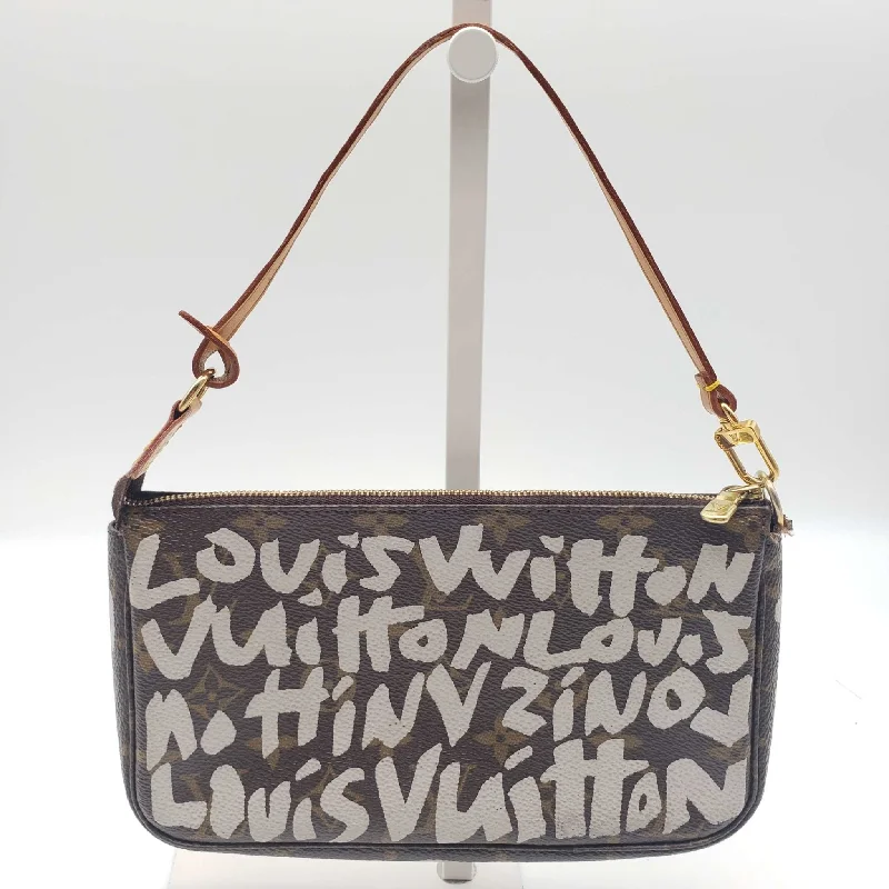 Louis Vuitton Twist bags with a contrast - colored interior for visual interestLouis Vuitton Accessories Brown Monogram Graffiti Hand Bag