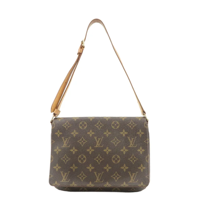 Louis Vuitton Twist bags with a snakeskin - effect panel for a bold lookLouis Vuitton Monogram Musette Tango Short Shoulder Bag M51257