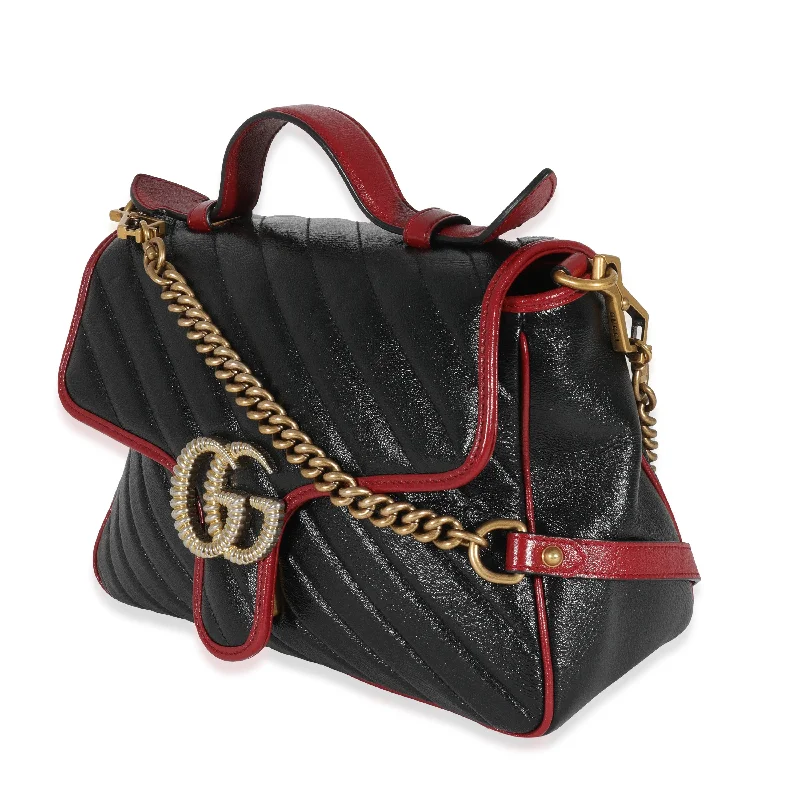 Ladies Gucci shoulder bags with a tassel decorationGucci Black Quilted Leather GG Marmont Small Torchon Top Handle