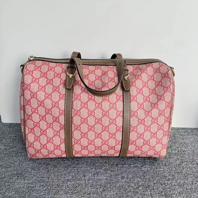 Gucci tote bags for women with a printed Gucci logoGucci Pink Canvas GG Supreme Boston Bag Medium