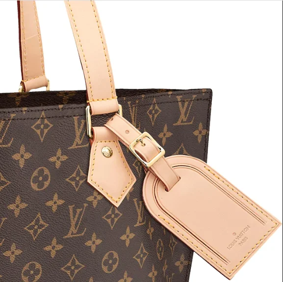 Louis Vuitton Twist bags with a snakeskin - effect panel for a bold lookLouis Vuitton All-In MM