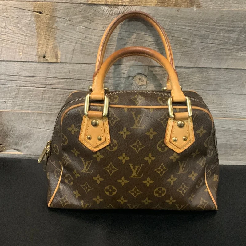 Louis Vuitton tote bags with a water - resistant coating for outdoor useLouis Vuitton Monogram Manhattan PM Bag