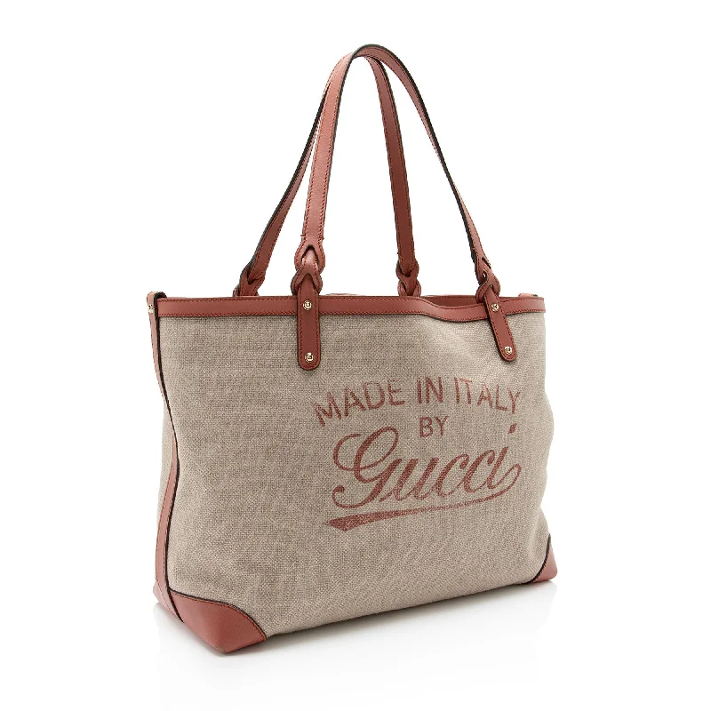 Women Gucci bags with a front - zip pocket for small itemsGucci Canvas Leather Craft Tote (AuAMnM)