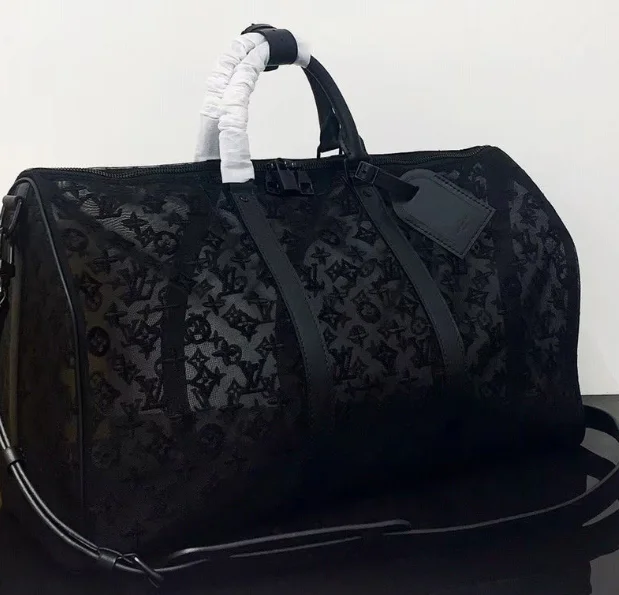 Louis Vuitton Twist bags with a snakeskin - effect panel for a bold lookLouis Vuitton Abloh Keepall Bandouliere 50 Mesh Monogram