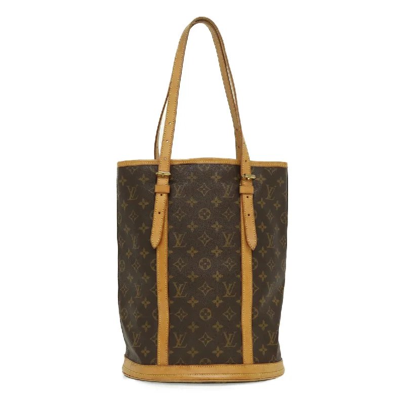 Louis Vuitton crossbody bags with a woven leather strap for textureLouis Vuitton Brown Canvas Bucket shoulder bag