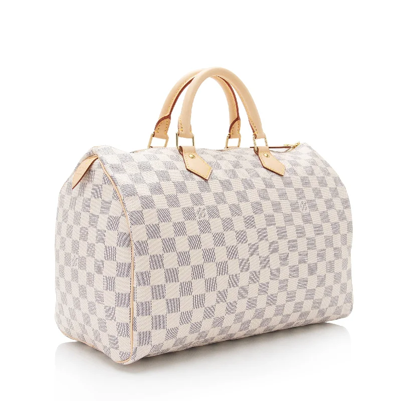 Louis Vuitton Twist bags with a contrast - colored interior for visual interestLouis Vuitton Damier Azur Speedy 35 Satchel (25zlLp)