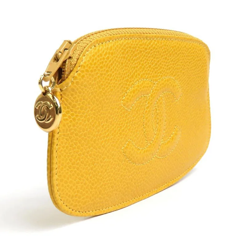 Chanel bags available in bold colors and patternsCHANEL Accessory Pouch Coco Mark Caviar Skin Leather Yellow Ladies