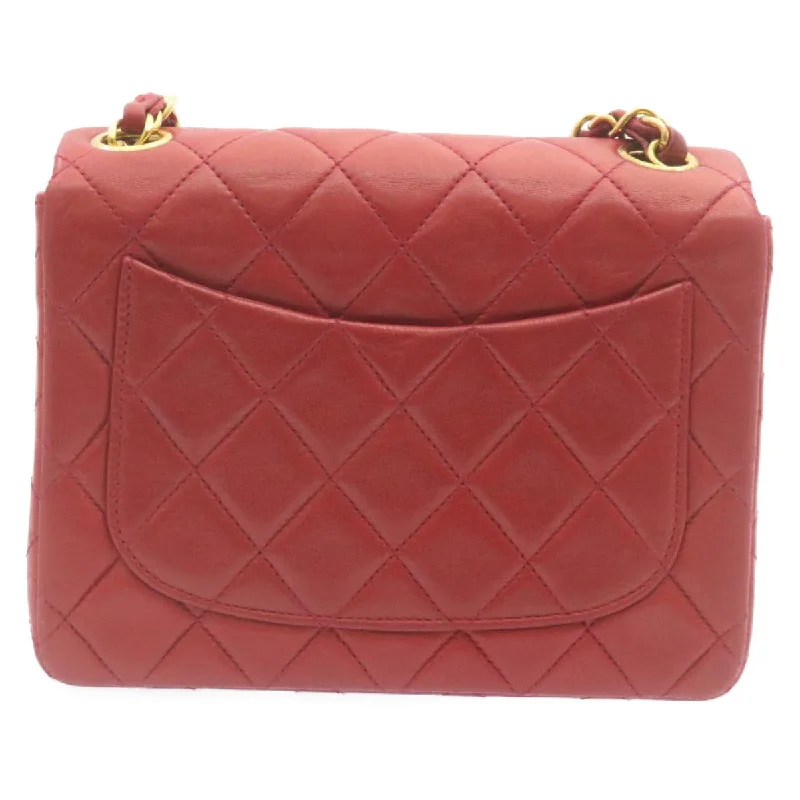 Chanel bags in luxury boutiques worldwideCHANEL Matelasse Chain Flap Shoulder Bag Lamb Skin Turn Lock Red CC Auth 28661A