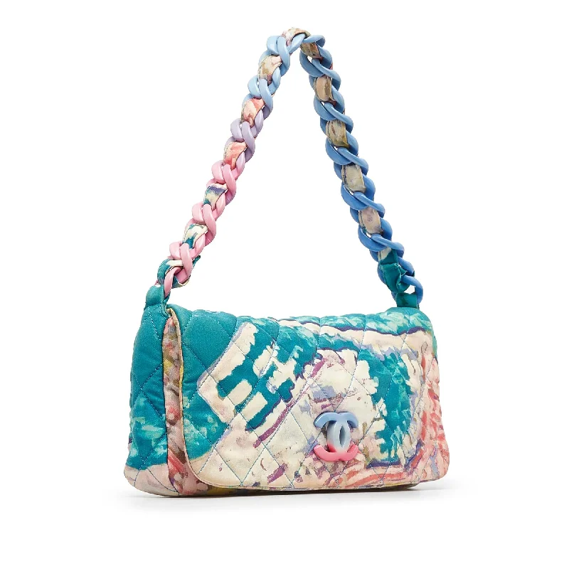 Chanel bags perfect for everyday elegChanel Printed Canvas Watercolor Pochette Flap (LineIE)