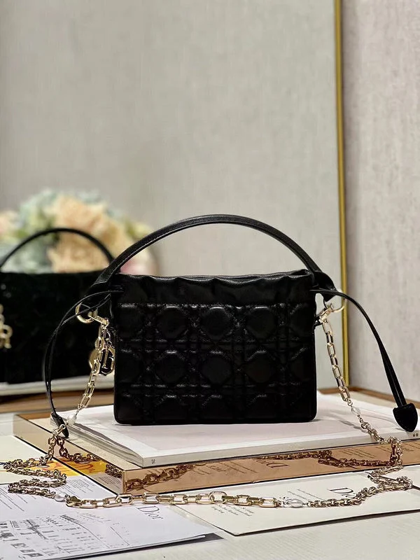 Christian Dior handbags with a snap - button closure and a decorative buckleDior Bag