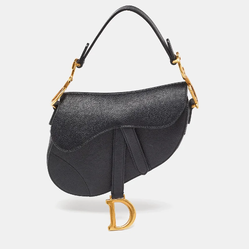 Christian Dior Saddle bags with a patent leather finish for a shiny lookDIOR Black Leather Mini Saddle Bag