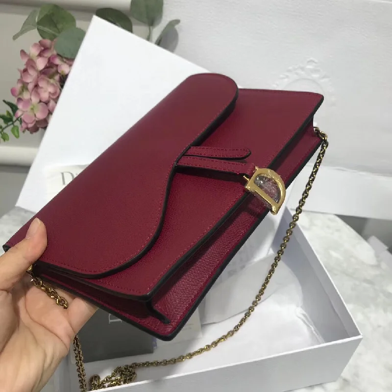 Contemporary Christian Dior handbags with a unique shapeChristian Dior Bordeaux Calskin Saddle Chain Clutch