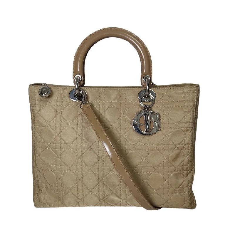 Christian Dior bags with a quilted pattern and gold - toned hardwareChristian Dior Christian Lady bag in beige nylon