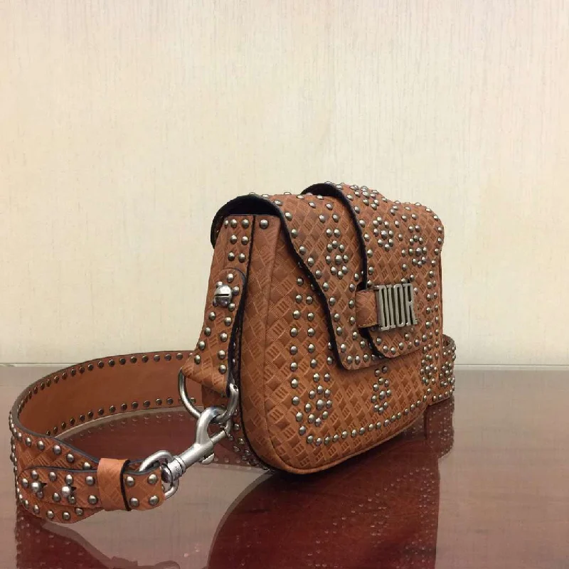 Trendsetting Christian Dior crossbody bags with a colorful strapDior D-Fence Saddle Bag In Brown Studded Calfskin