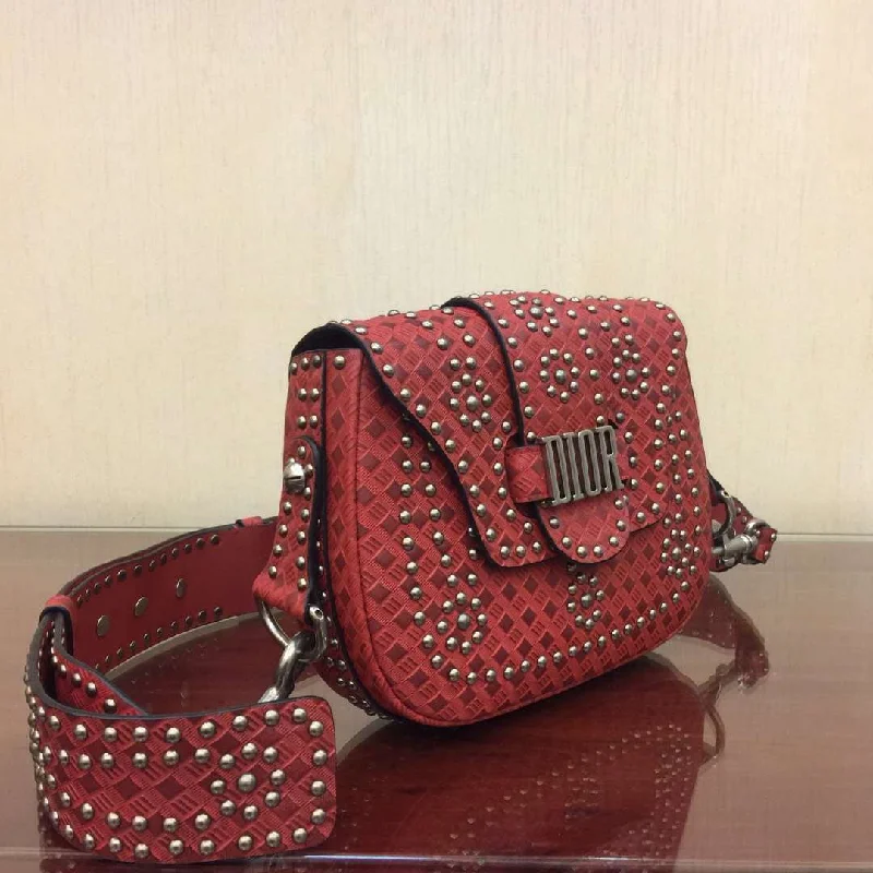 Christian Dior backpacks with a sleek, minimalist silhouetteDior D-Fence Saddle Bag In Red Studded Calfskin