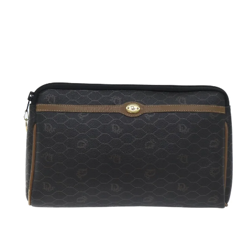 Christian Dior Saddle bags with a patent leather finish for a shiny lookDior Honeycomb Clutch Bag