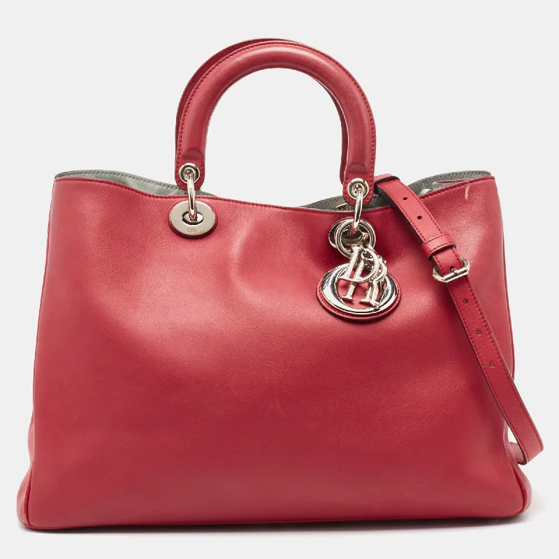 Christian Dior handbags with a snap - button closure and a decorative buckleDIOR Red Leather Large issimo Shopper Tote