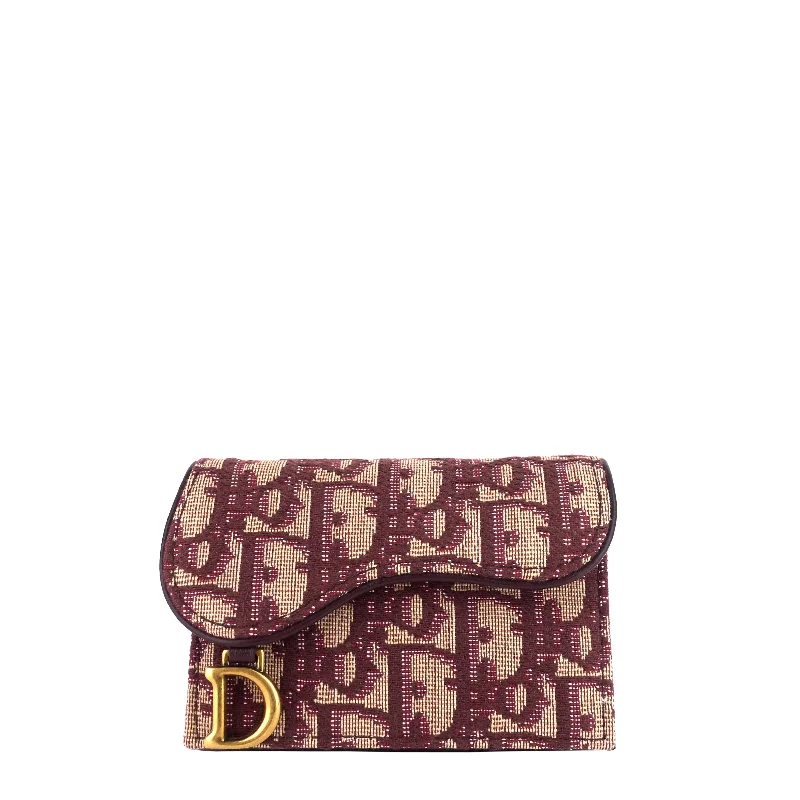 Christian Dior handbags with a detachable mirror for on - the - go touch - upsDIOR Saddle Lotus Dior Oblique Jacquard Wallet