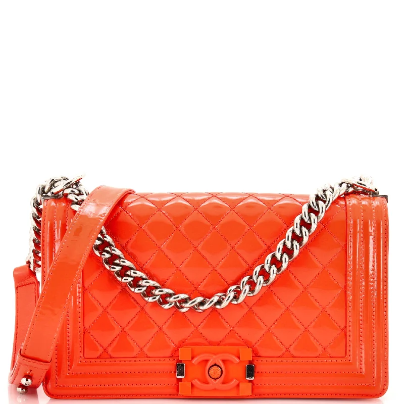 Christian Dior handbags with a snap - button closure and a decorative buckleBoy Flap Bag Quilted Plexiglass Patent Old Medium