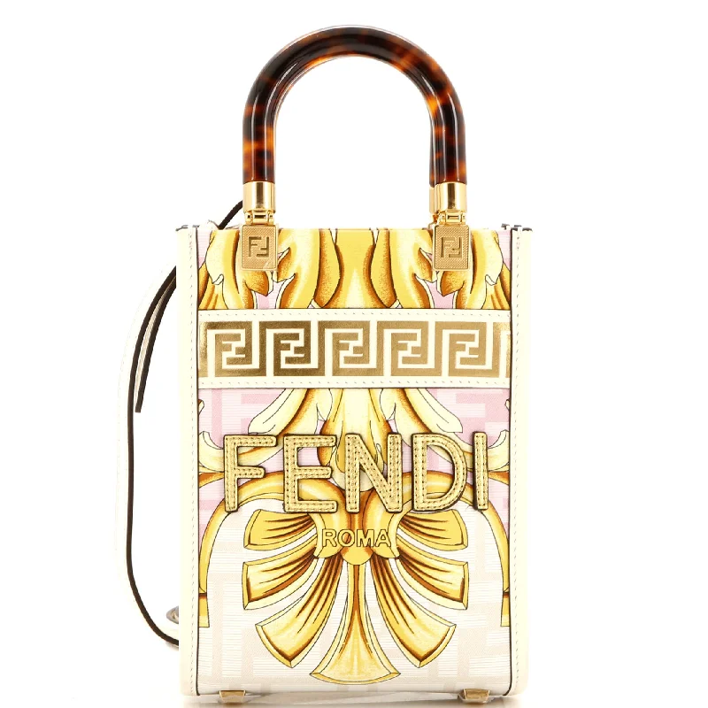 Christian Dior bags with a quilted pattern and gold - toned hardwarex Versace Fendace Convertible Sunshine Shopper Tote Printed Laminated Leather Mini